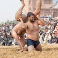 Indian wrestlers doing their practice during Camel festival in Rajasthan, India