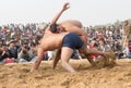 Indian wrestlers doing their practice during Camel festival in Rajasthan, India