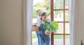 Indian young couple move the box into the home at new home. Relocation, moving to new home concept