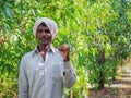 Indian young rural farmer with spade at latur maharashtra