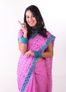 Indian young saying excellent with her hand Royalty Free Stock Photo