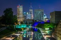 The Indiana Central Canal and downtown skyline at night in Indianapolis, Indiana