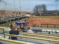 Indiana state players greet teammate at home plate