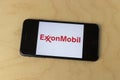 ExxonMobil logo on a smartphone. ExxonMobil is the largest oil and gas company
