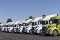 Volvo Semi Tractor Trailer Trucks Lined up for Sale. Volvo is one of the largest truck manufacturers Royalty Free Stock Photo