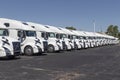 Volvo Semi Tractor Trailer Trucks Lined up for Sale. Volvo is one of the largest truck manufacturers Royalty Free Stock Photo