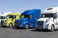 Volvo Semi Tractor Trailer Trucks Lined up for Sale. Volvo is one of the largest truck manufacturers Royalty Free Stock Photo