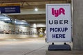 Lyft and Uber pickup spot at the airport. Lyft and Uber ride sharing has replaced many Taxi cabs for transportation I