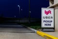 Lyft and Uber pickup spot at the airport. Lyft and Uber ride sharing has replaced many Taxi cabs for transportation II