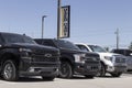 Used pickup trucks at a dealership. With supply issues, used and preowned cars are in high demand Royalty Free Stock Photo