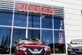 Indianapolis - Circa March 2018: Logo and Signage of a Nissan Car and SUV Dealership I Royalty Free Stock Photo