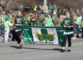 Unidentified Girls walking with Cathedral High School Sign at St Patricks Day Parade in Indianapolis, IN