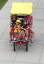 Unidentified Family with Children behind wheels having fun by the Canal at Downtown in Indianapolis, IN, USA Royalty Free Stock Photo