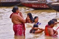 Indians bathing and praying in Ganges, Varanasi, India Royalty Free Stock Photo