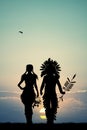 Indians couple silhouette at sunset