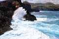 Indic sea waves hitting the cliff rocks at AngelÃ¢â¬â¢s Billabong point, an amazing spot close to Broken beach in Nusa Penida Island