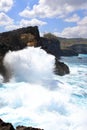 Indic sea waves hitting the cliff rocks at AngelÃ¢â¬â¢s Billabong point, an amazing spot close to Broken beach in Nusa Penida Island