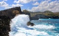 Indic sea waves hitting the cliff rocks at AngelÃ¢â¬â¢s Billabong point, an amazing spot close to Broken beach in Nusa Penida Island