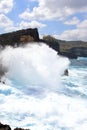 Indic sea waves hitting the cliff rocks at AngelÃ¢â¬â¢s Billabong point, an amazing spot close to Broken beach in Nusa Penida Island