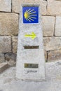 Indicator of the Camino de Santiago. Road sign in stone.