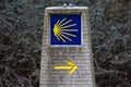 Indicator of the Camino de Santiago. Road sign in stone.