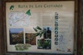 Indicator sign with location map and photos at the start of the chestnut tree route in Rozas de Puerto Real, Madrid. Spain