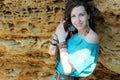 Indie, hippie style woman with dreadlocks portrait near rocks Royalty Free Stock Photo