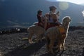 Indigence Peruvian women with lamas Royalty Free Stock Photo