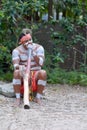 Indigenous Australian Man playing Aboriginal Music on Didgeridoo Instrument Royalty Free Stock Photo