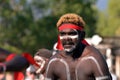 Indigenous Australians aboriginal adult man dancing a cultural ceremony dance Royalty Free Stock Photo