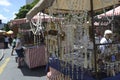 Indigenous Brazilian man selling arts and crafts at a street mar