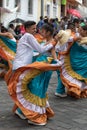 indigenous couple dancing in colonial clothes