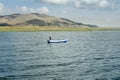 Indigenous Couple On Lake Titicaca