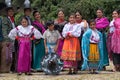 Indigenous dancers posing at a rural rodeo in Ecuador