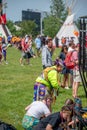 Indigenous dancers preparing for a powwow