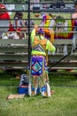 Indigenous dancers preparing for a powwow