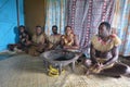 Indigenous Fijians men participate in traditional Kava Ceremony