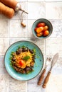 Indigenous Ghanaian, African-Caribian food Jollof Rice with tomato sauce, regional spices, chicken meat and offal