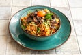 Indigenous Ghanaian, African-Caribian food Jollof Rice with tomato sause, regional spices, chicken meat and offal Royalty Free Stock Photo