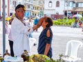 Indigenous healer performing health ceremony, Ecuador