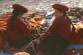 Indigenous Inca woman working with textils in the Chinchero market , Cusco, Peru UNESCO world heritage city