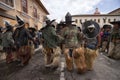 Indigenous kechwa men wearing chaps and oversized hats