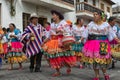 Indigenous kechwa people dancing outdoors in Ecuador