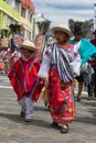 Indigenous kichwa girl and boy at the Corpus Christi parade