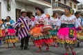 Indigenous kichwa people dancing outdoors