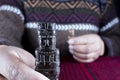 the indigenous man's hand holds a monolith, . Tiwanaku