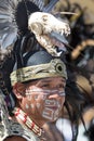 Indigenous man wearing traditional head dress