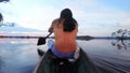 Indigenous Man On Wooden Canoe,