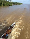 Indigenous People with traditional wooden canoo: Amazon River: Brasil Royalty Free Stock Photo