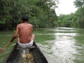 Indigenous piaroa in native boat, Cataniapo River Amazonas state venezuela